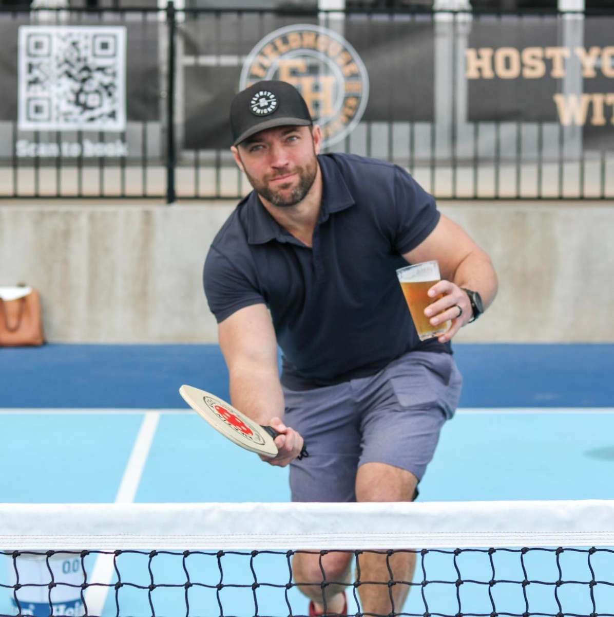 man playing pickle ball