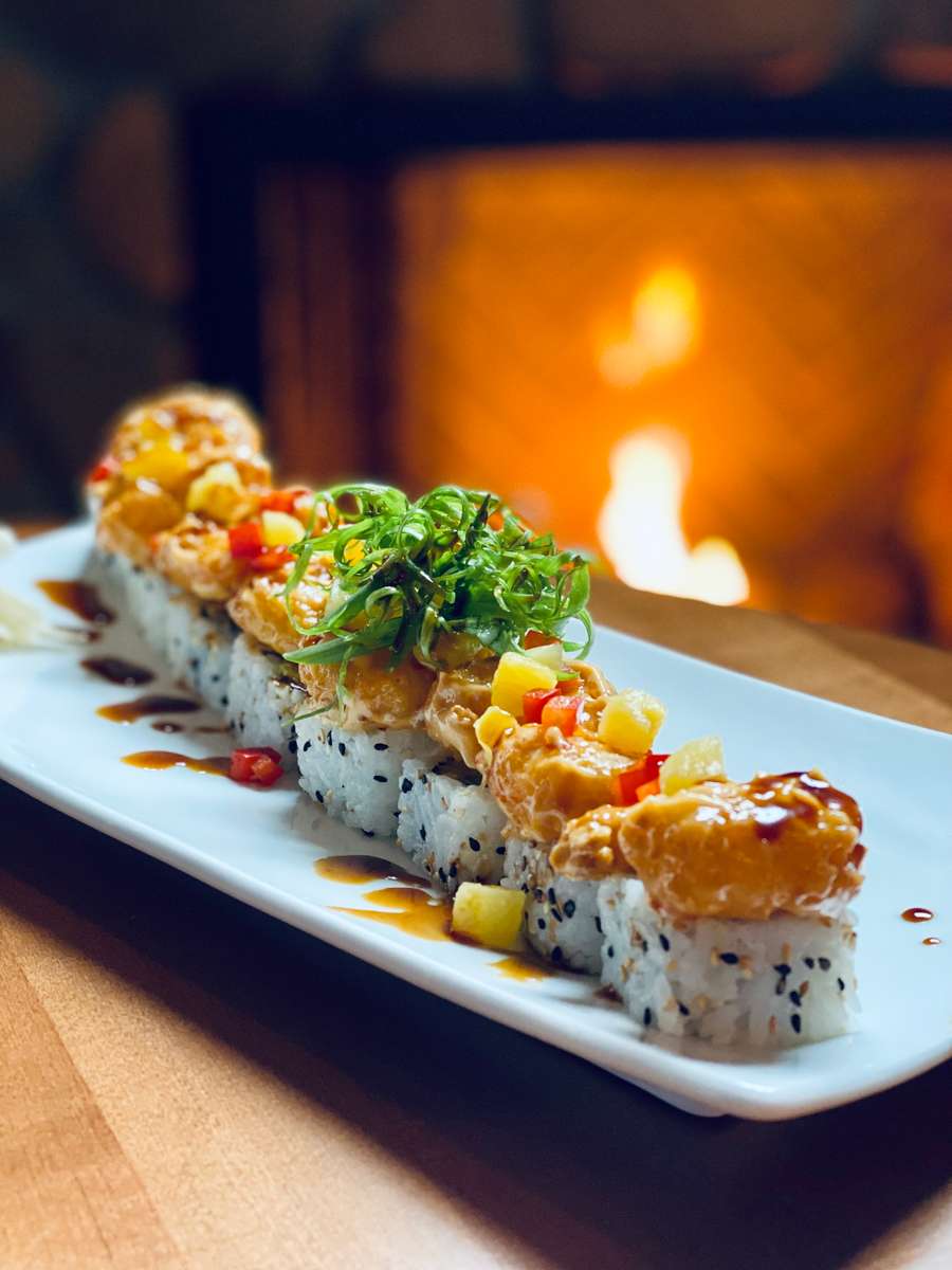 Sushi in front of Fireplace