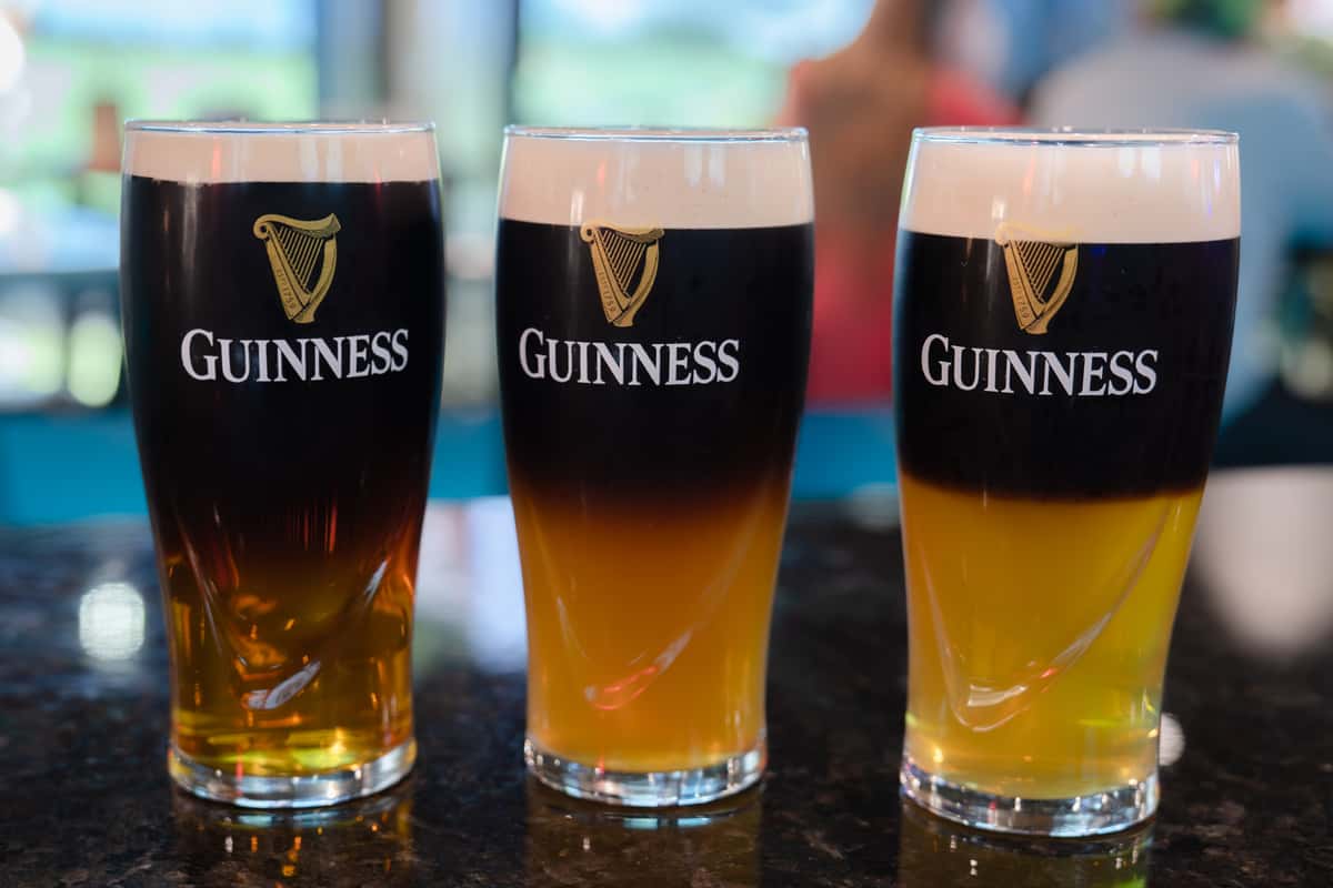 Three large pints of Guinness beer