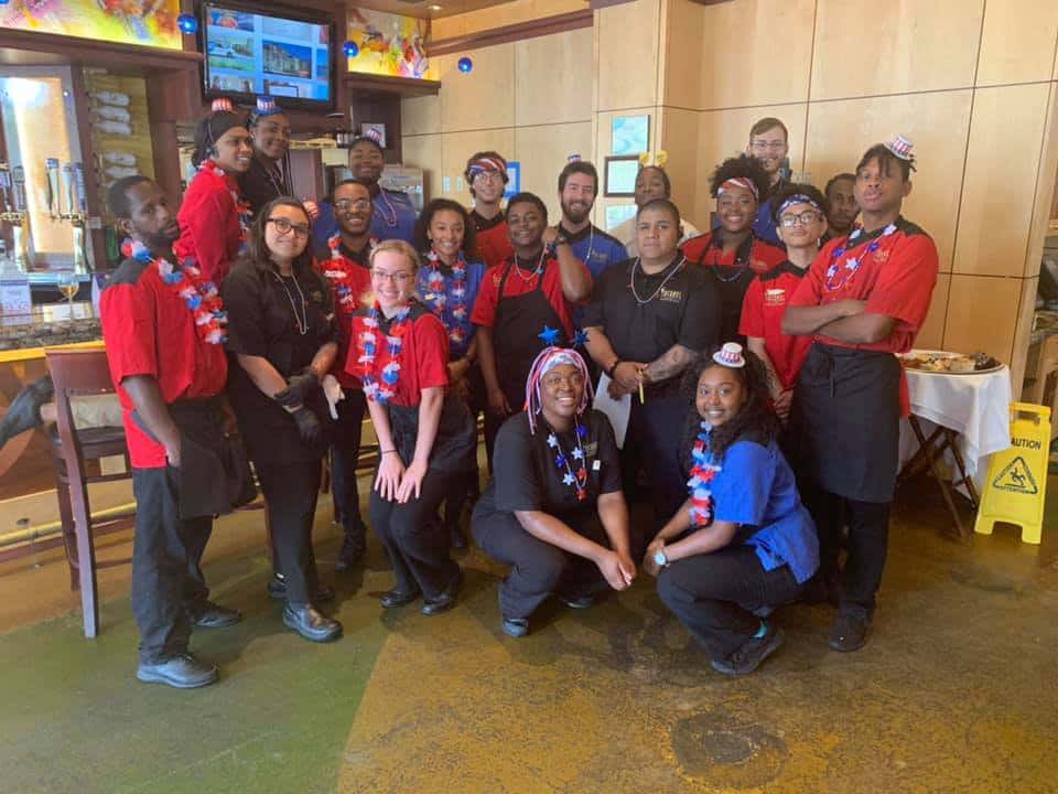 Tucanos employees smiling for a team photo