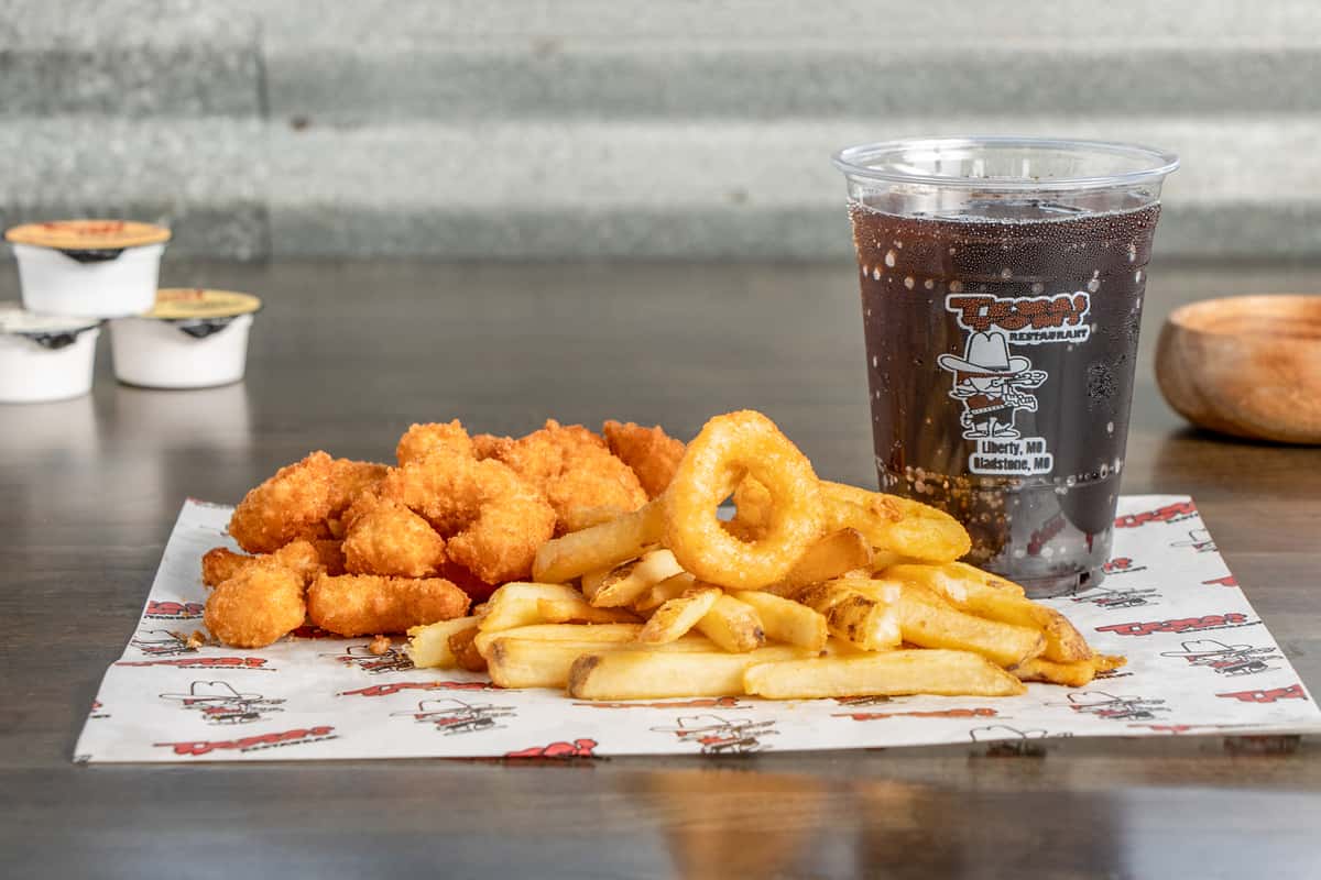 shrimp and chicken basket with seasoned fries and a soft drink