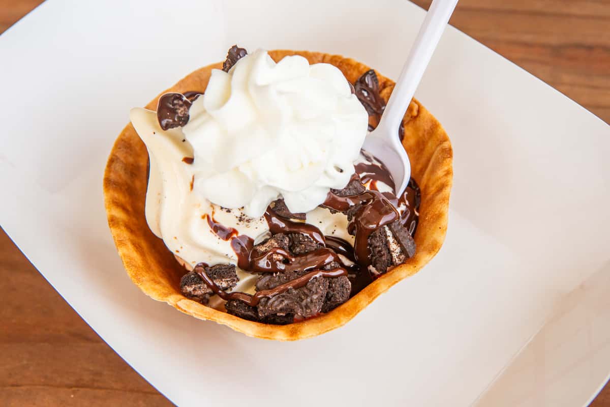 Oreo sundae with creamy soft serve, chocolate sauce, and cookie pieces at Jimmy's Burgers & Pizza