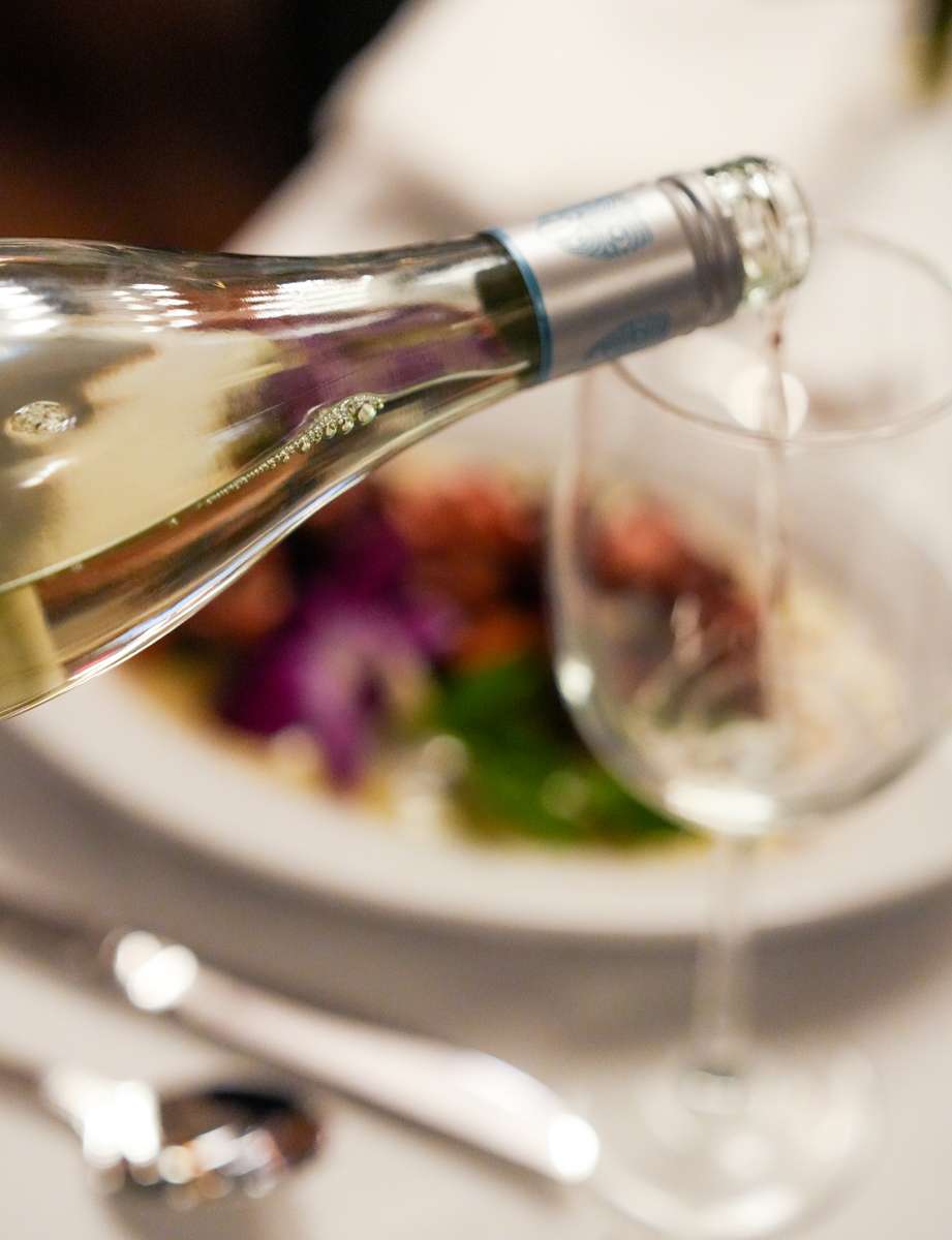 Big Blue table, white wine, ambiance, Happy Hour