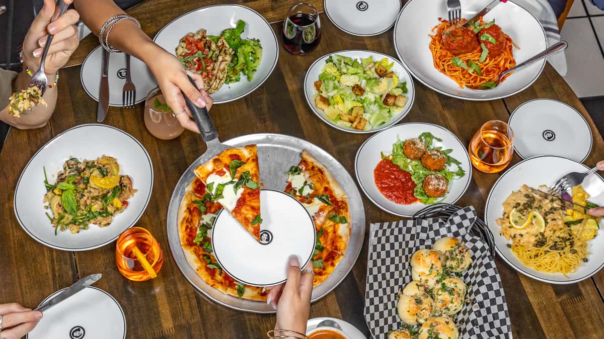 A top down picture of a group of people sharing a meal