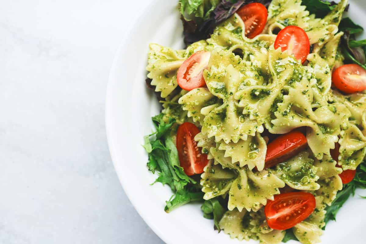 Bowl of pasta salad with fresh vegetables