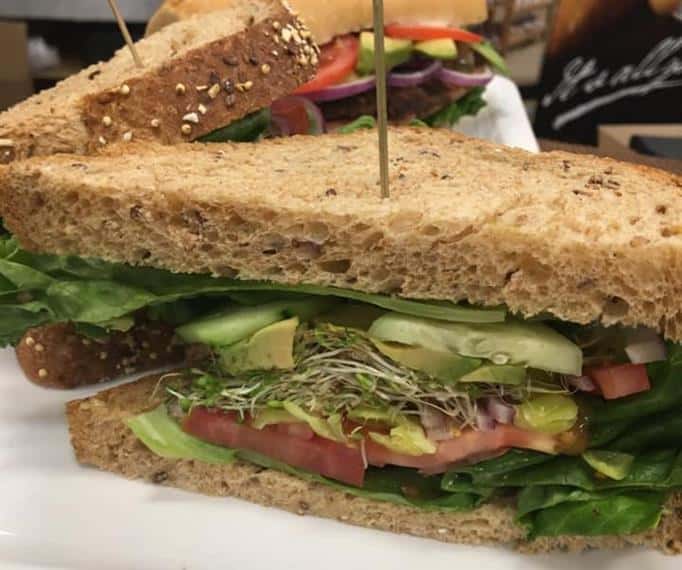lettuce, tomato, and cucumber on wheat bread
