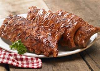 Baby back BBQ ribs on a plate