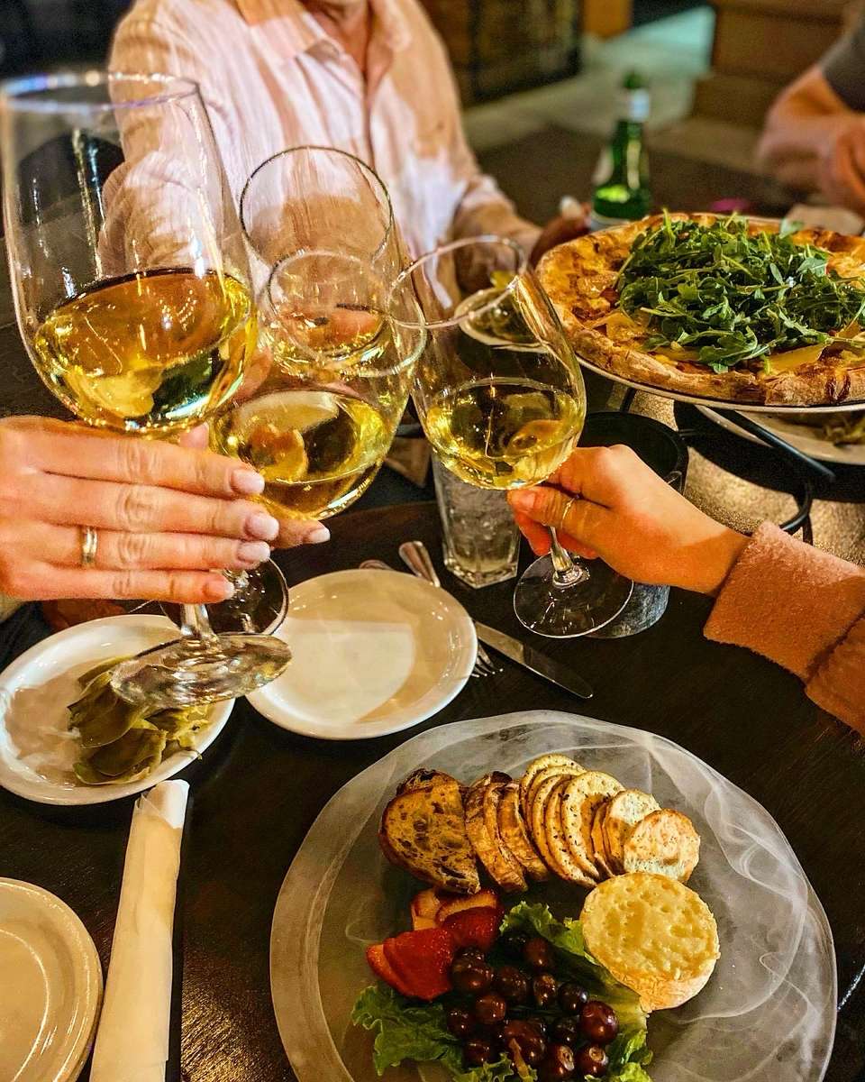 Toasting wine drinks over meals
