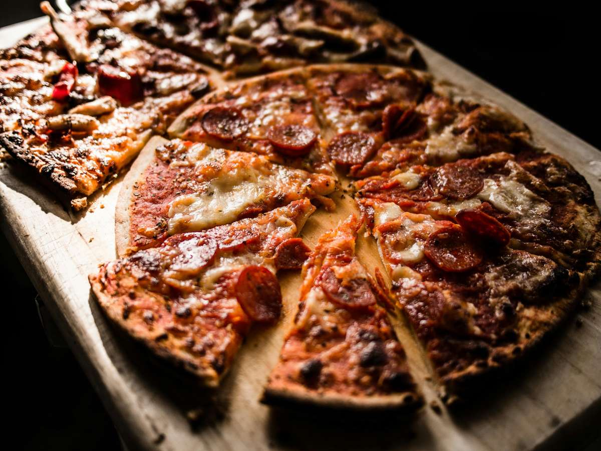 Slices of pizza with moody lighting