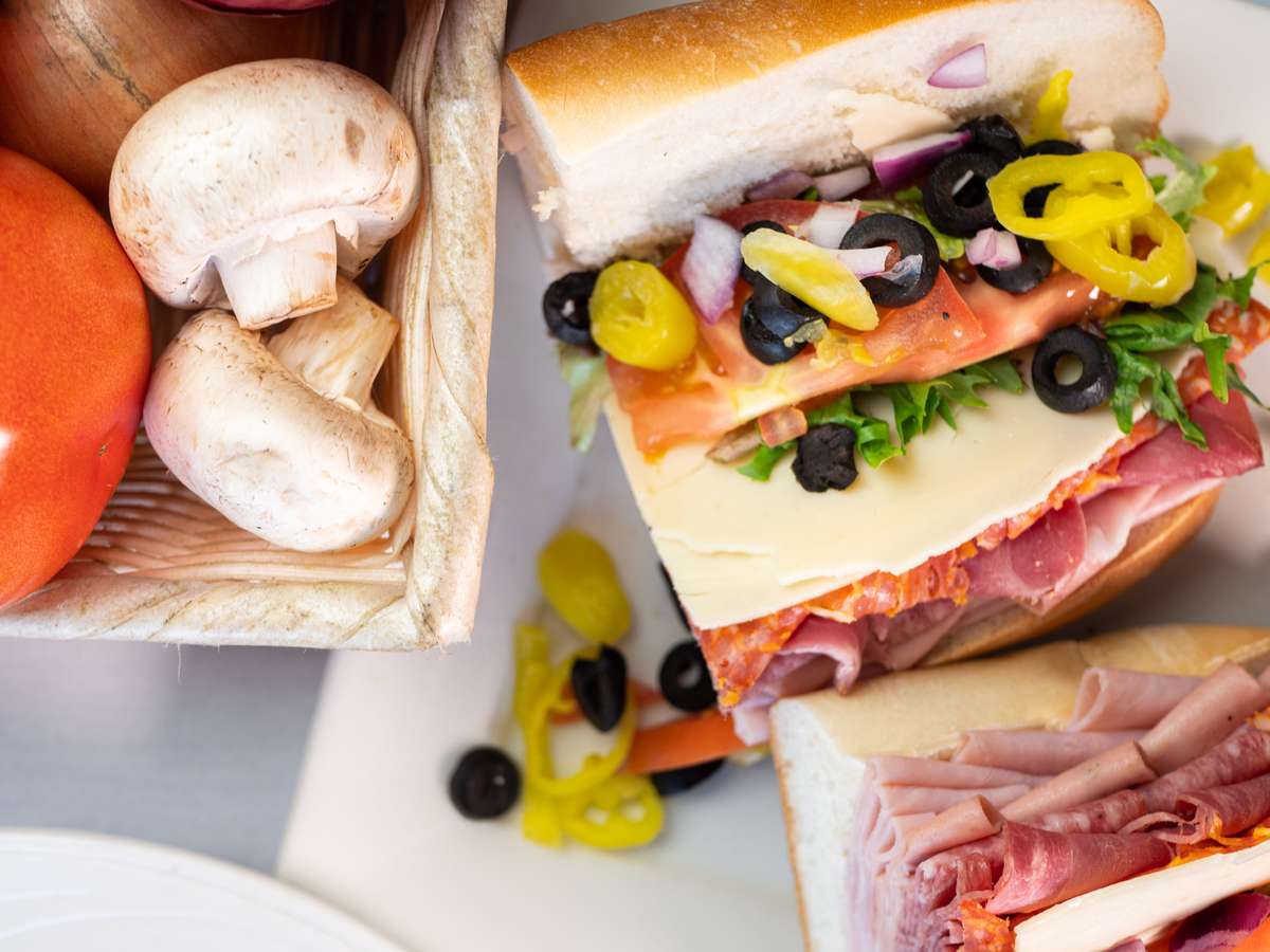 Top down view of Rufino's Italian Sub with ingredients on the side