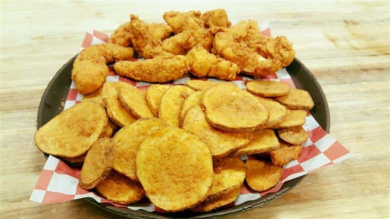 fried chicken with fried potato slices