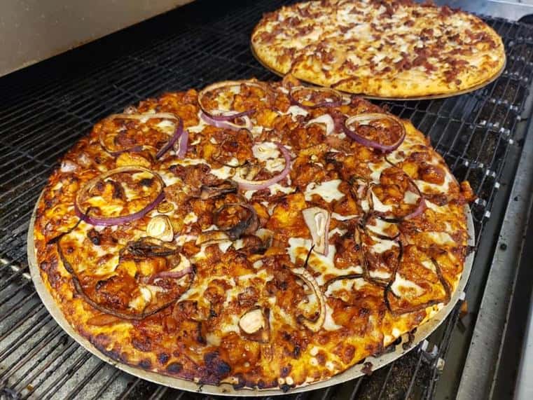 two large pizzas with assorted toppings
