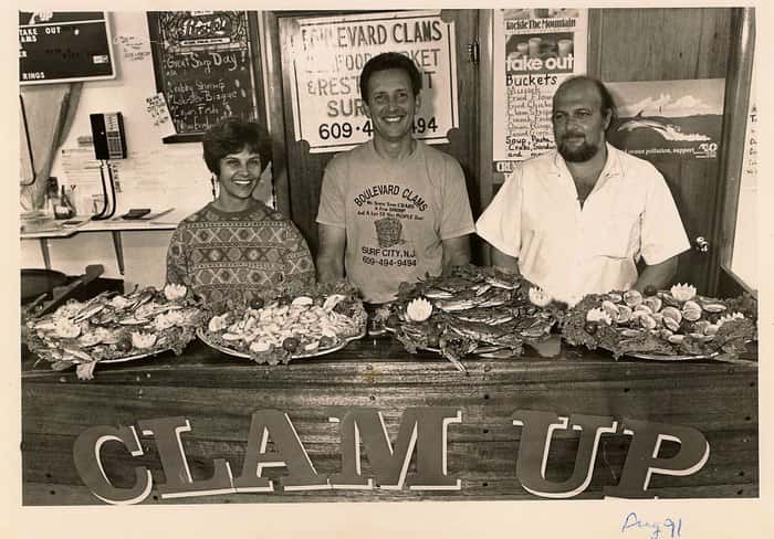 old photo of owners at counter