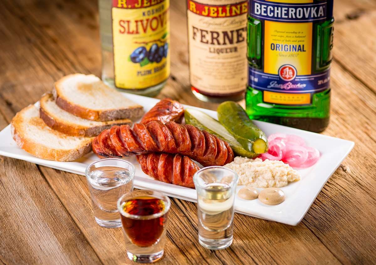 Sausages and drinks on a plate