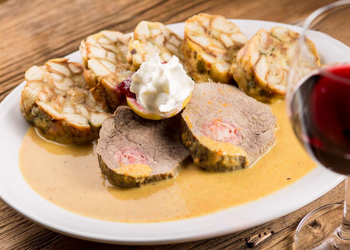 Sliced food in a creamy sauce