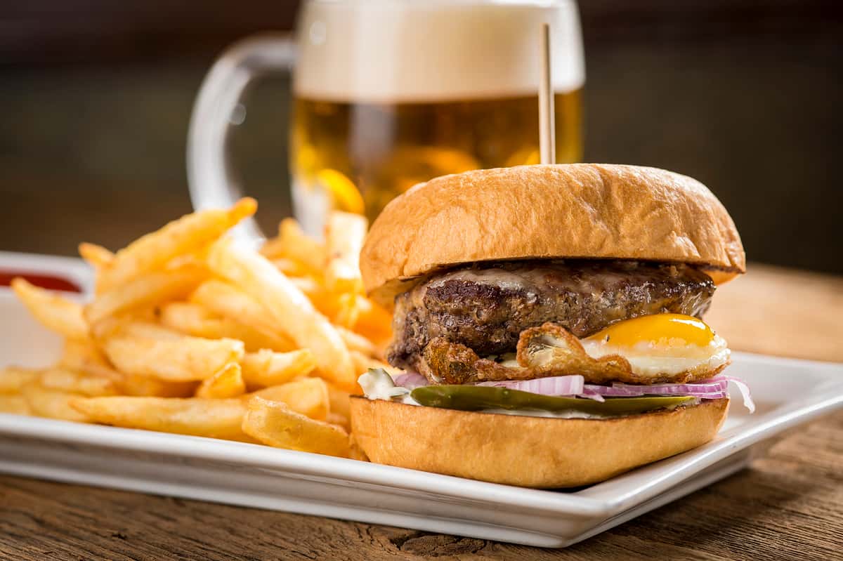 Burger served with fries