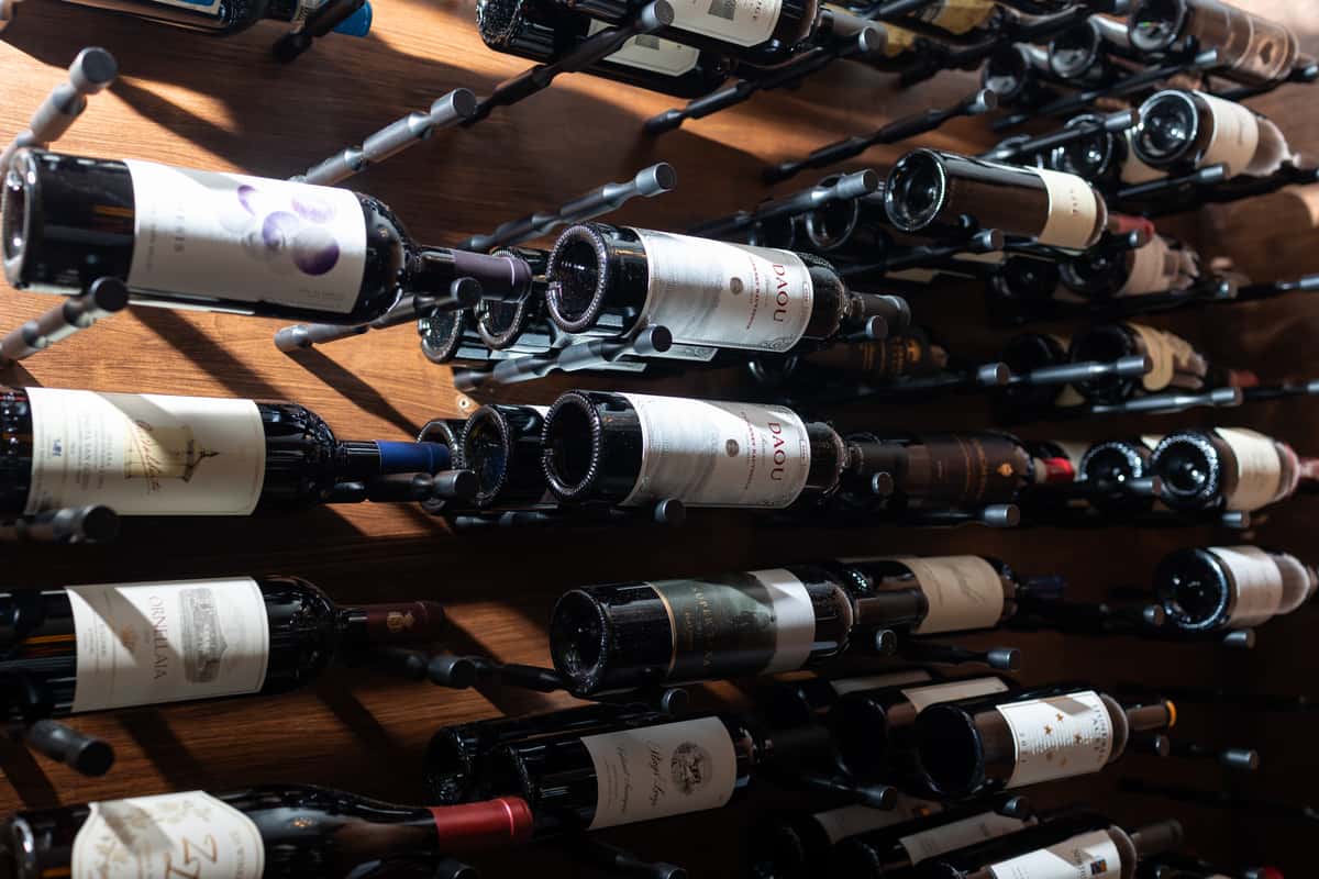 Wine bottles on a rack