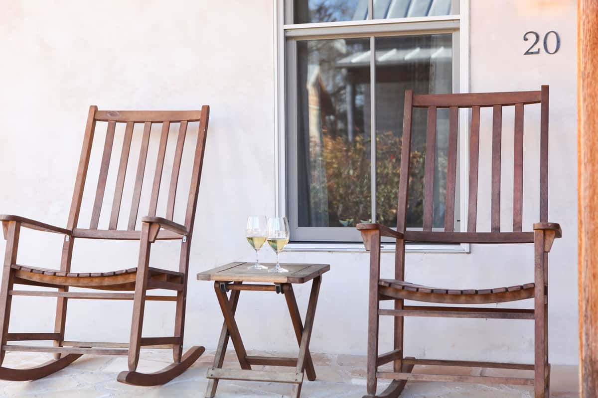 Rocking chairs on a white porch