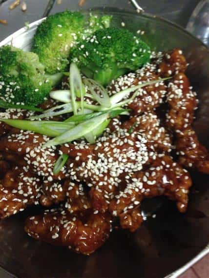 Sesame chicken and broccoli in bowl