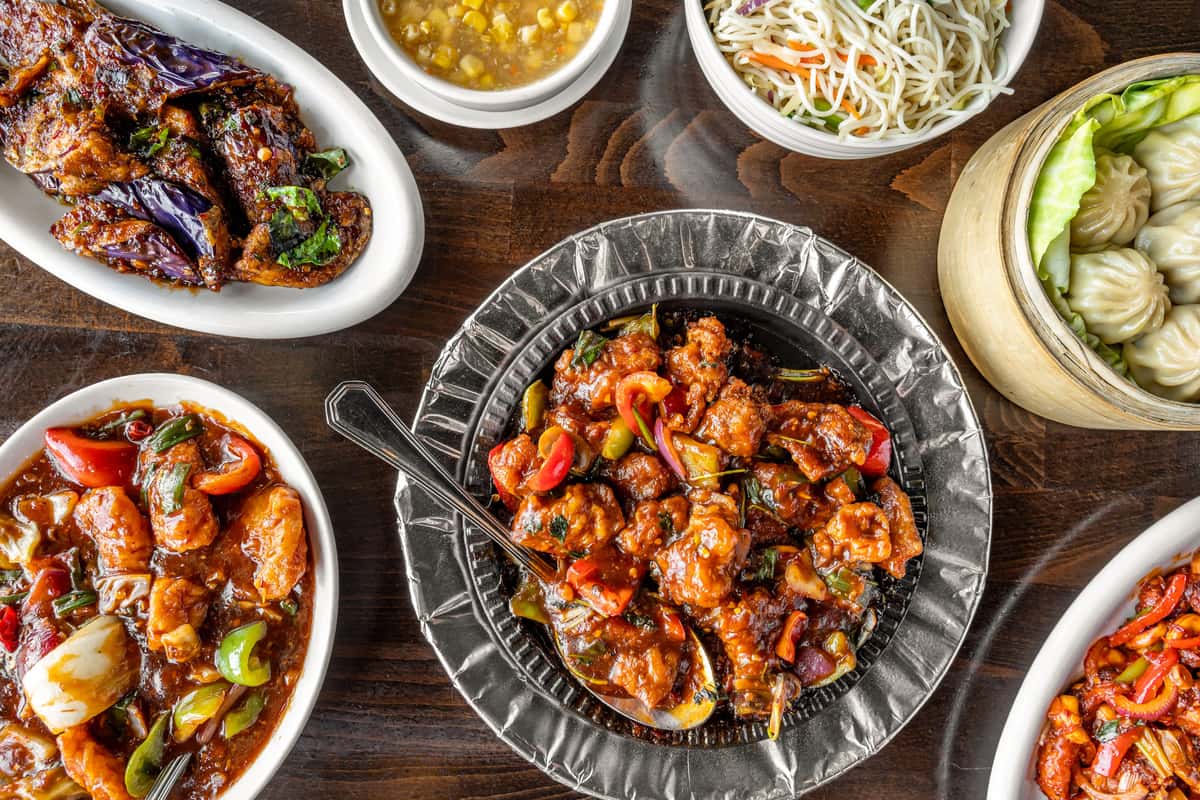 Group of dishes spread on table