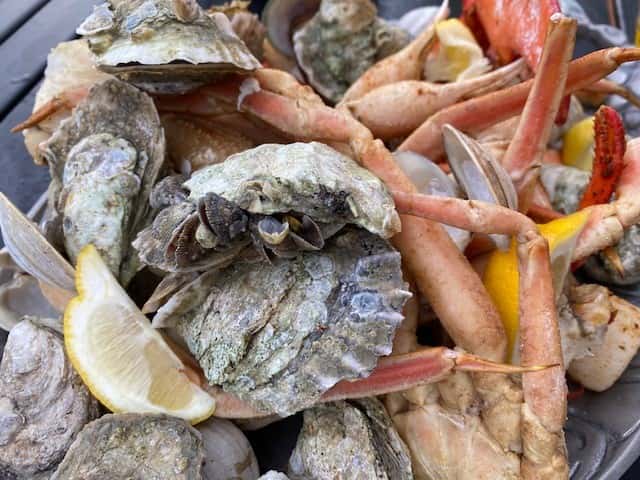 clams and crab legs tossed in seasonings and steamed
