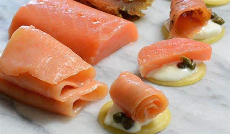 Sliced salmon with capers