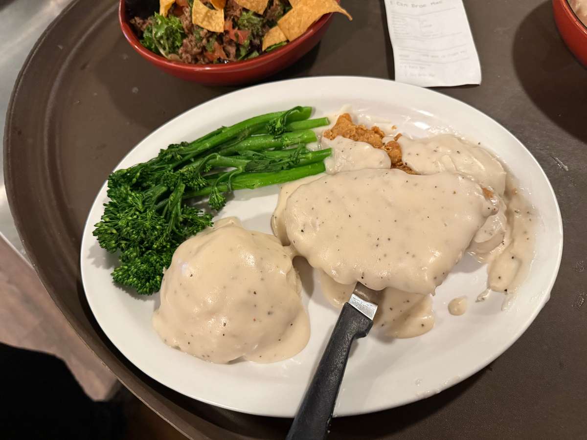 chicken with gravy and veggies