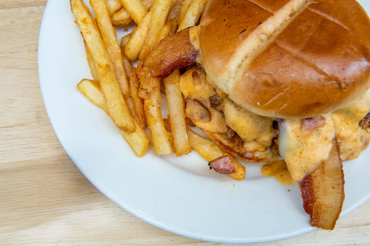 Pig sandwich with fries