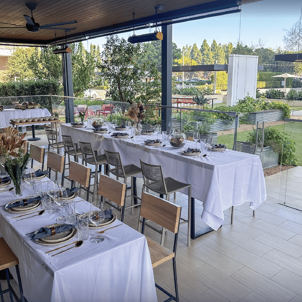 Catering set up with white tablecloths at the MET in Costa Mesa