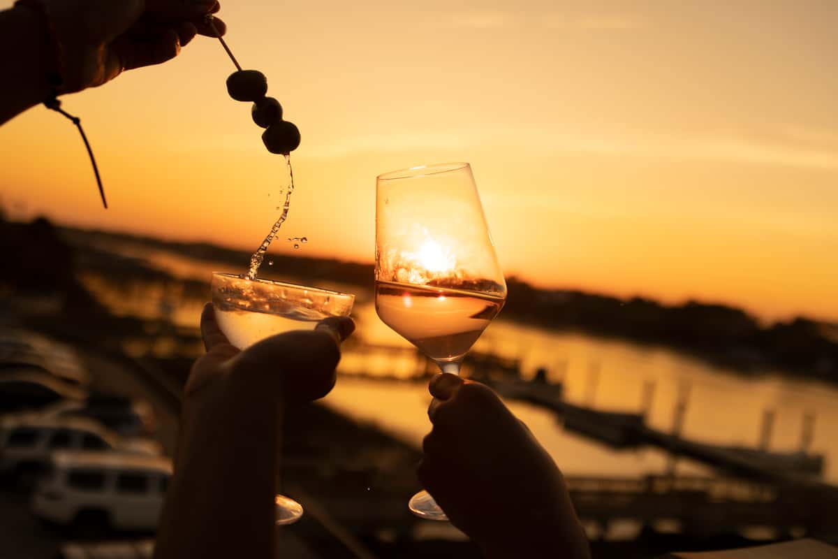 wine toast at sunset