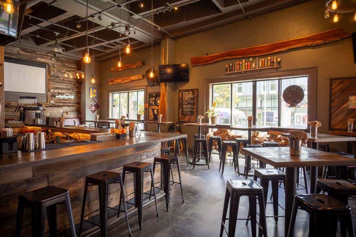 Spacious private dining room at Hardwood Bar & Smokery in San Francisco with handcrafted wood furnishings and a relaxed barbecue restaurant ambiance