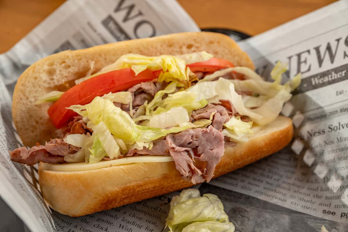 Roast Beef, Shredded Lettuce, Tomato, Cheese, Basil Oil