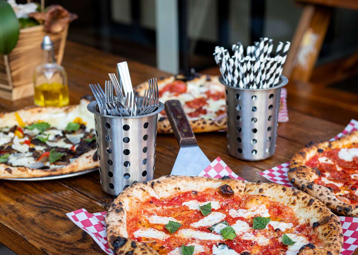 Multiple different pizzas