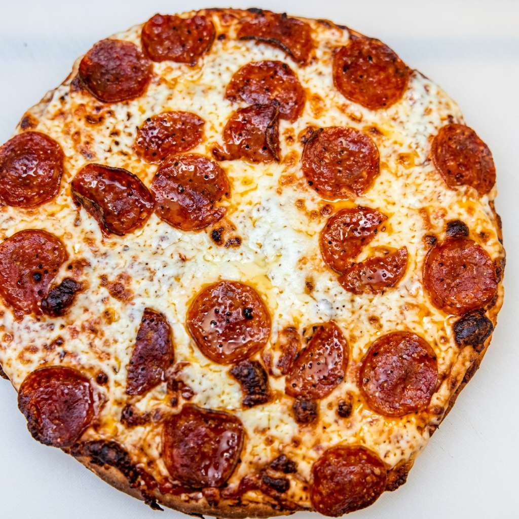 Pepperoni pizza with melted mozzarella cheese and crispy crust.