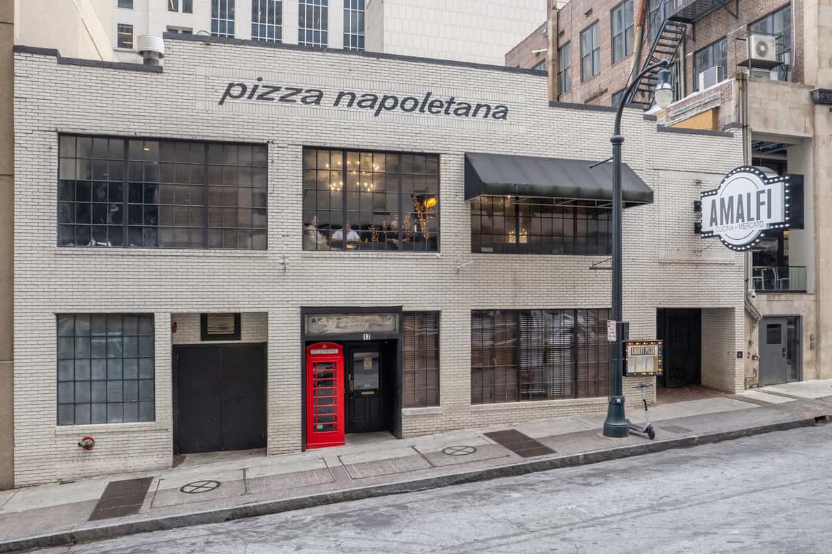 white-brick-building-red-phone-booth-atlanta