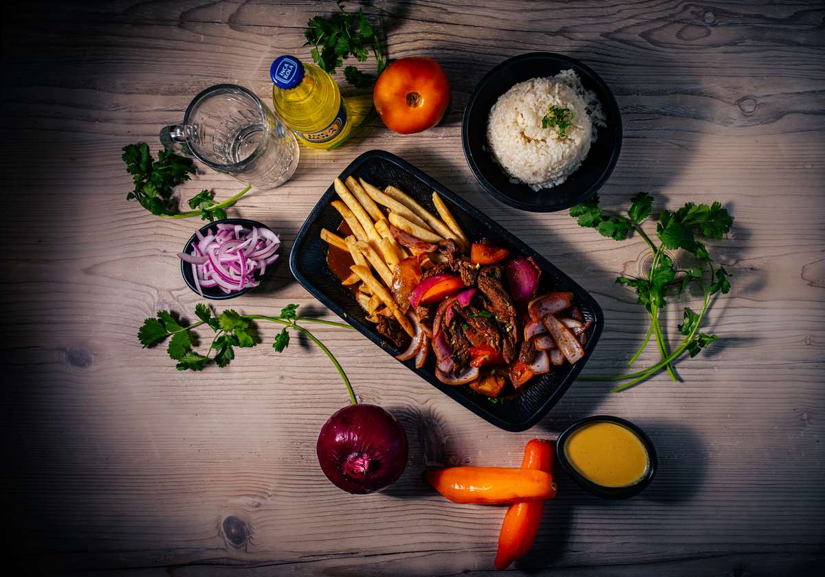 stir-fry steak with white rice and french fries