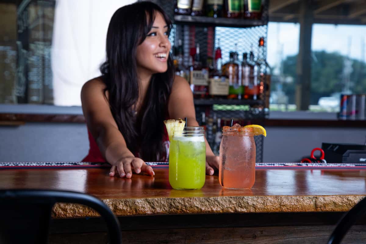 barkeep serving cocktails