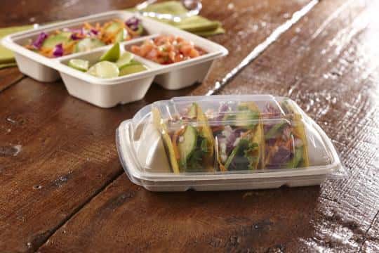 Two Step Taqueria individually packaged tacos with salsa and lime for catering in Austin