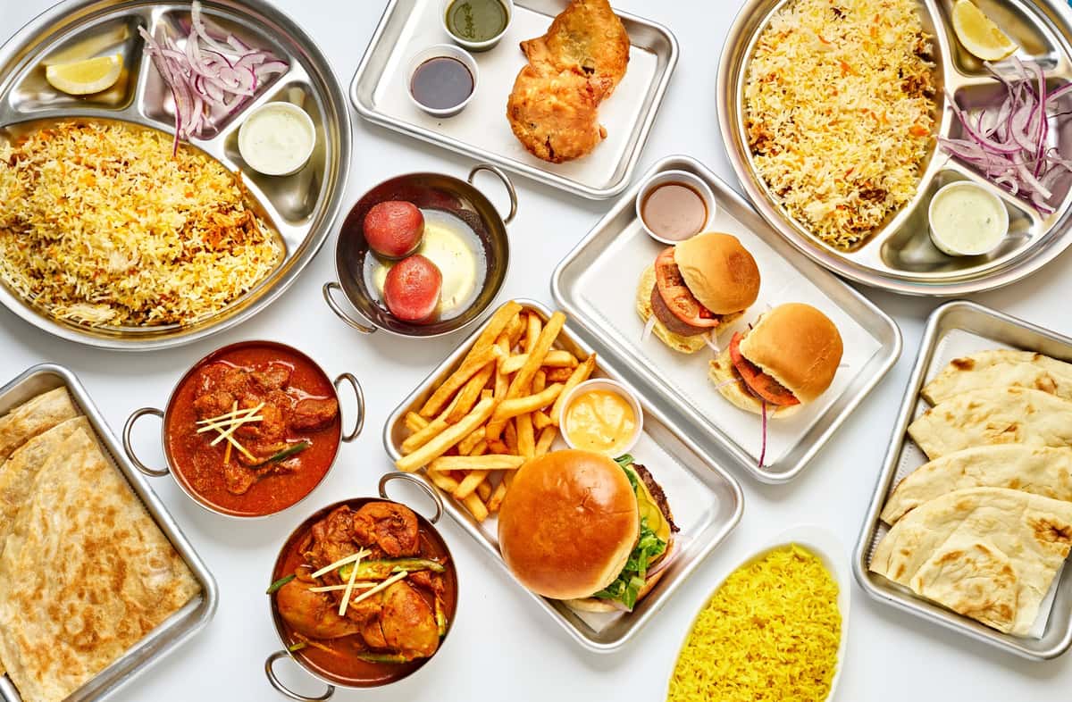 A spread of Indian and Pakistani food on a table