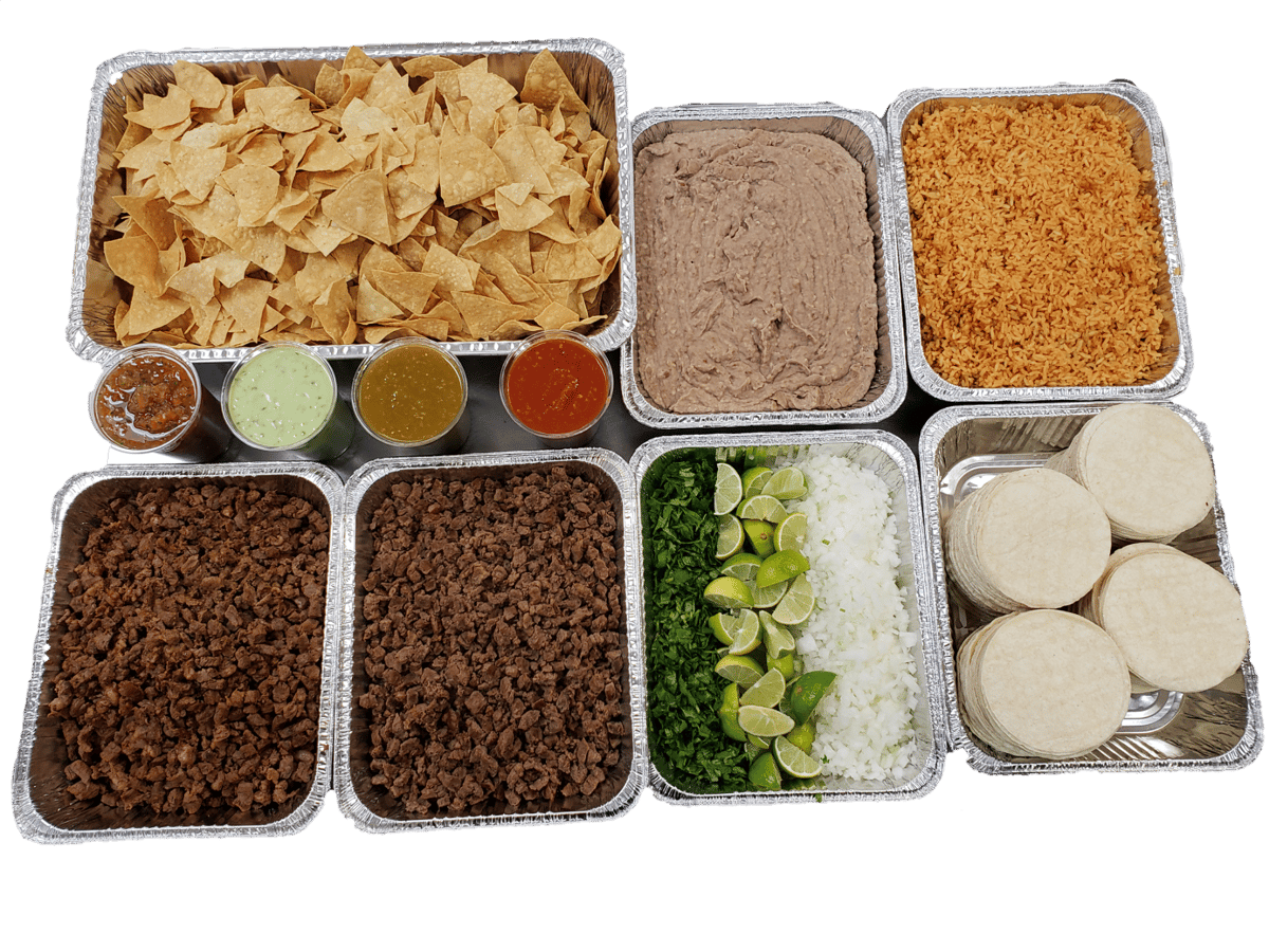 Catering Trays With Rice, Beans, Chips, Meat, and Tortillas