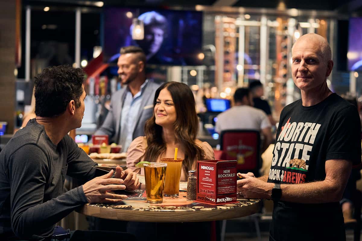 people drinking and dining together