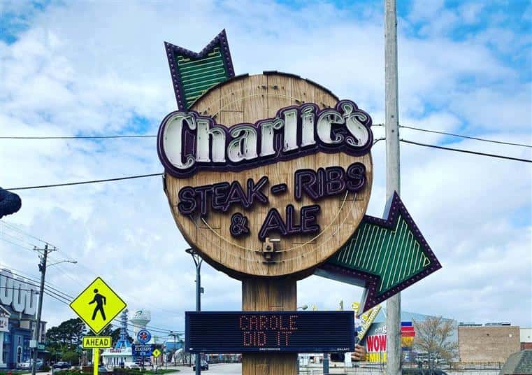 large sign for charlie's steak ribs and ale