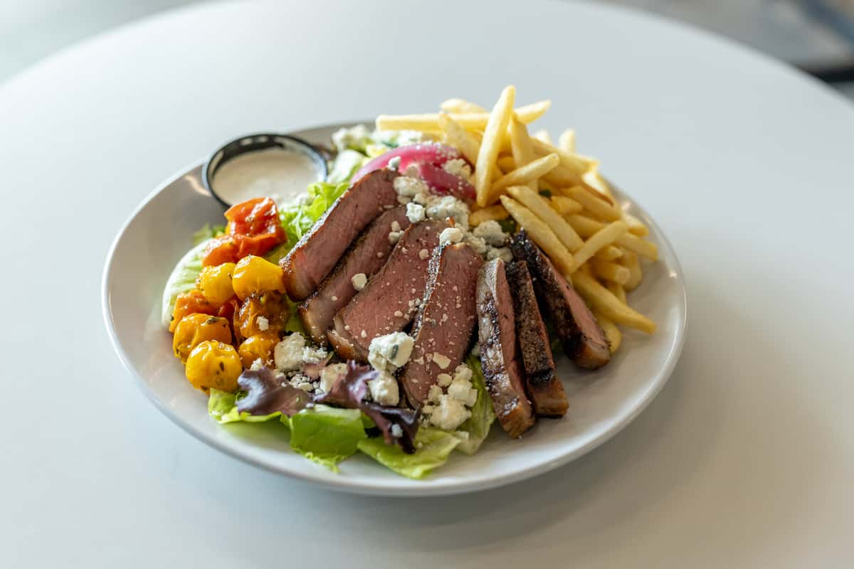 Salad with steak and fries