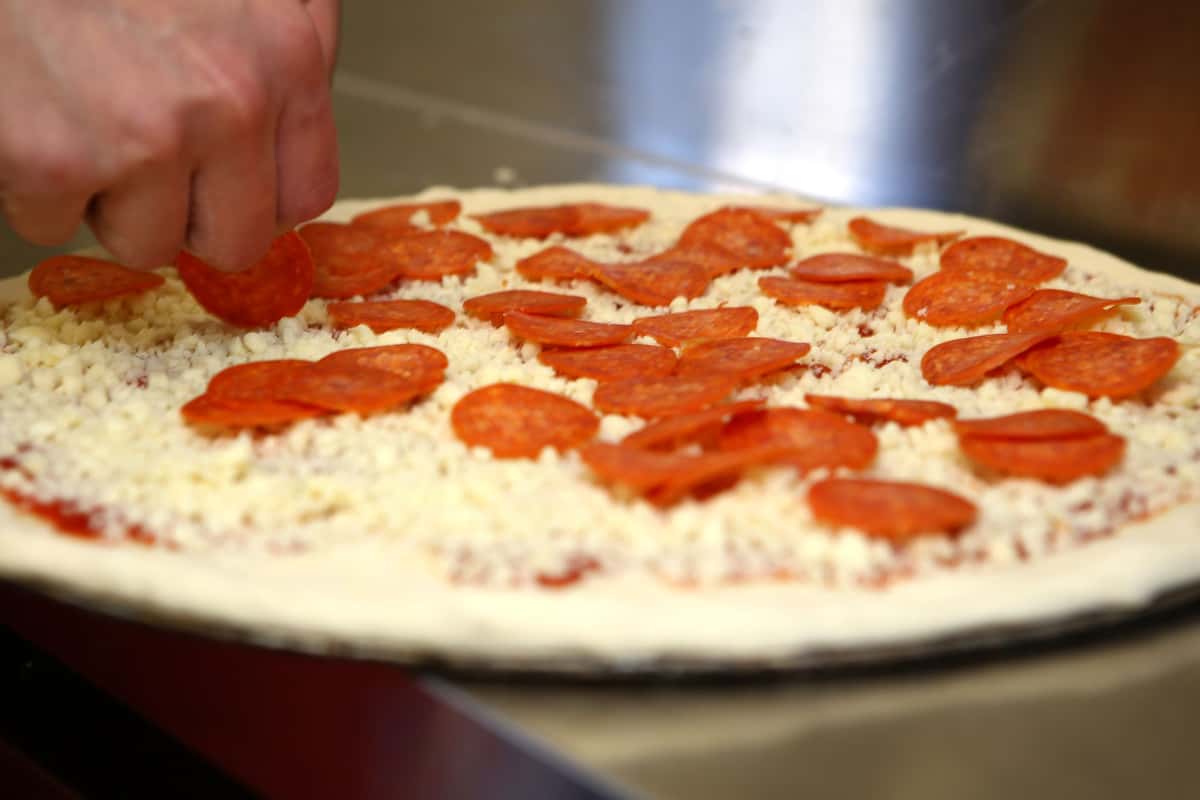Placing the Pepperoni