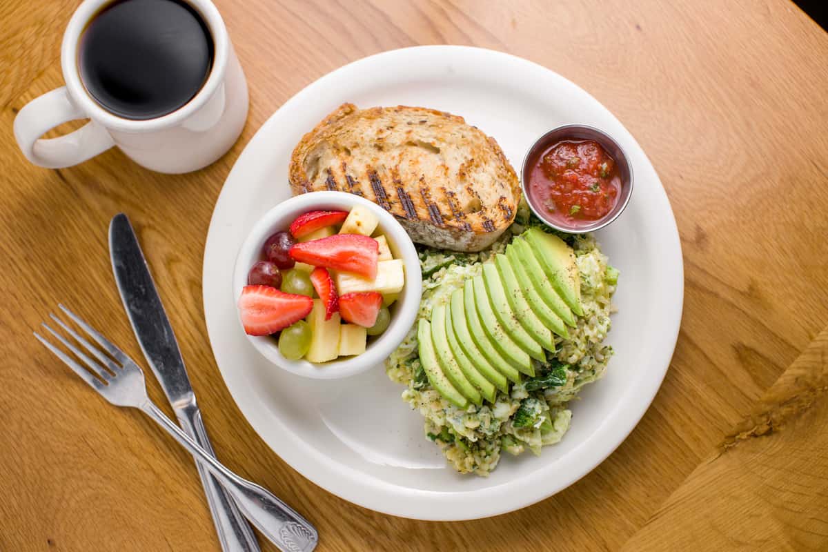 Brown rice, egg whites broccoli, spinach, pesto and avocado, with whole grain bread and fruit