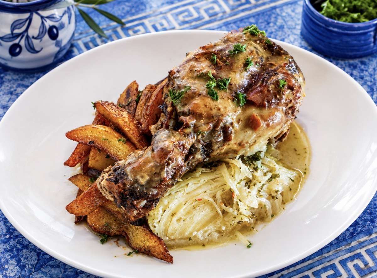 Lamb chop on top of pasta