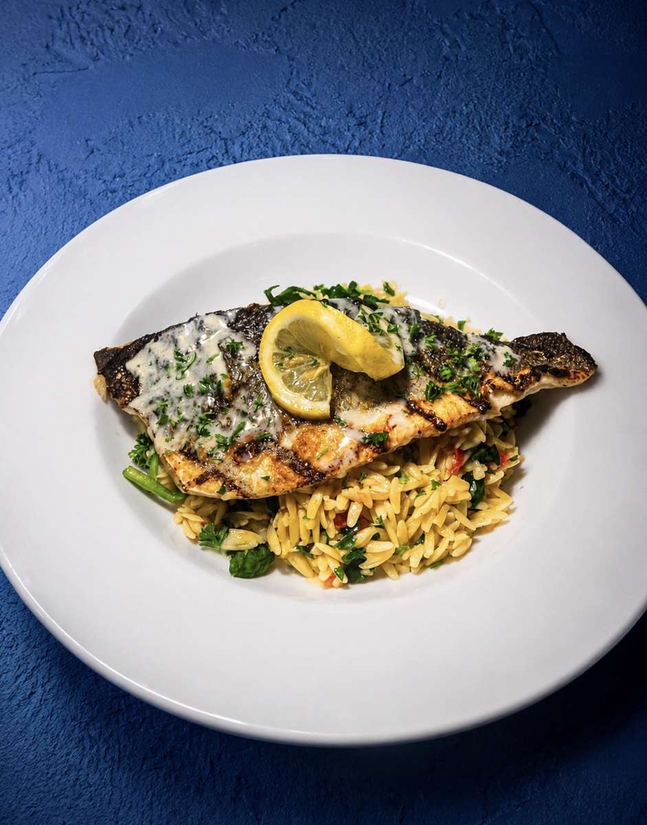 Seafood dish on top of pasta