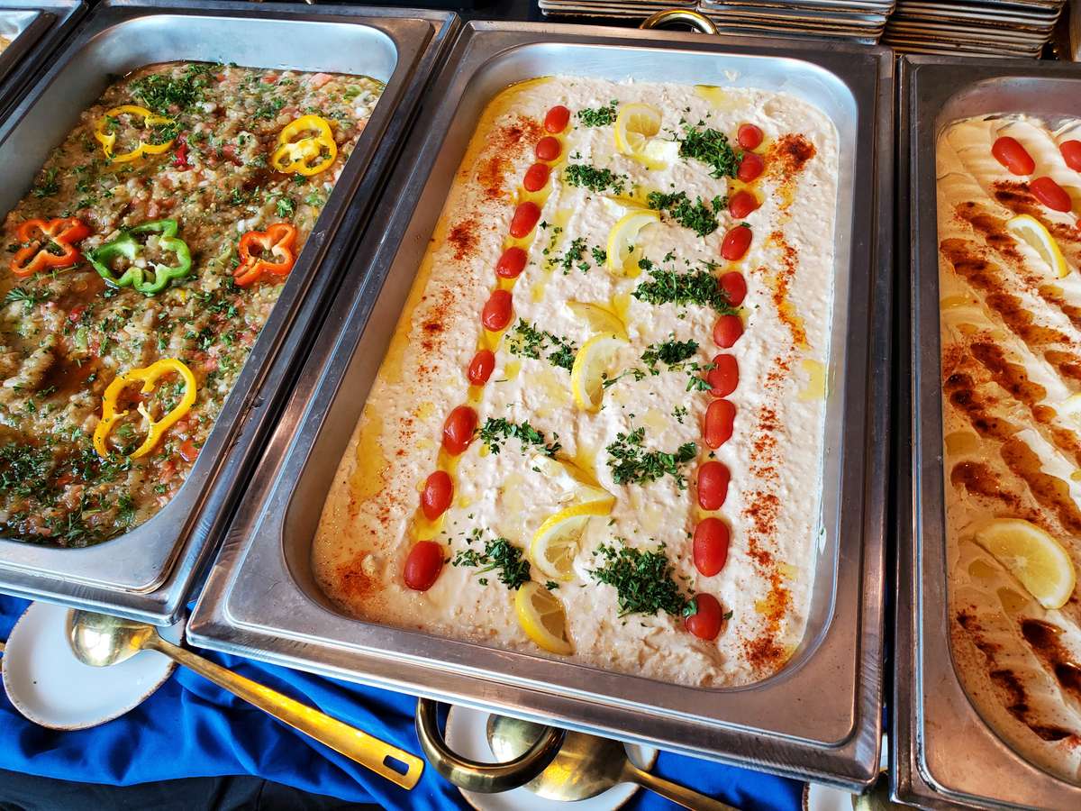 Mediterranean food in a catering dish