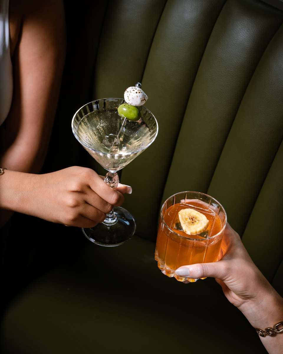 People cheering with drinks