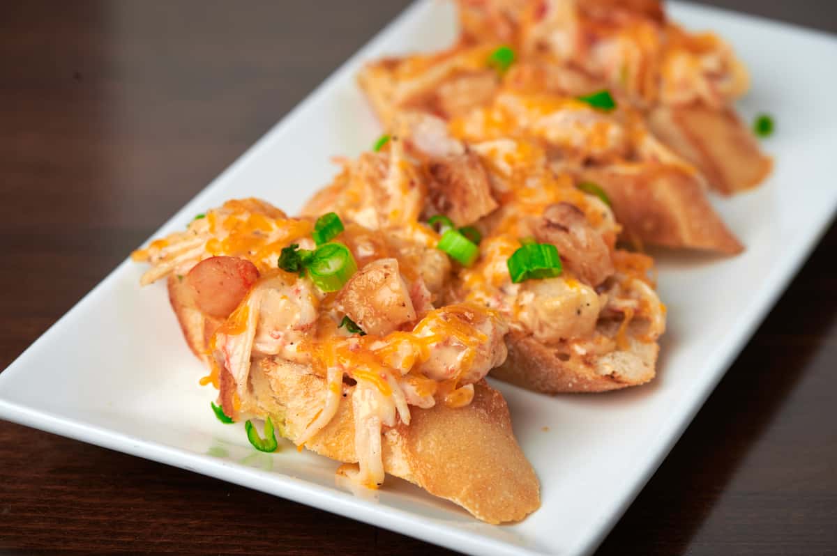 Shrimp Toast on a white rectangle plate